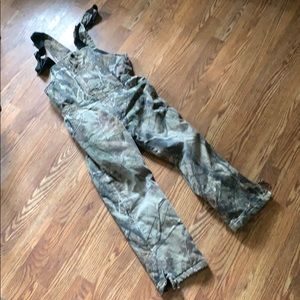 Boys camo insulated overalls.